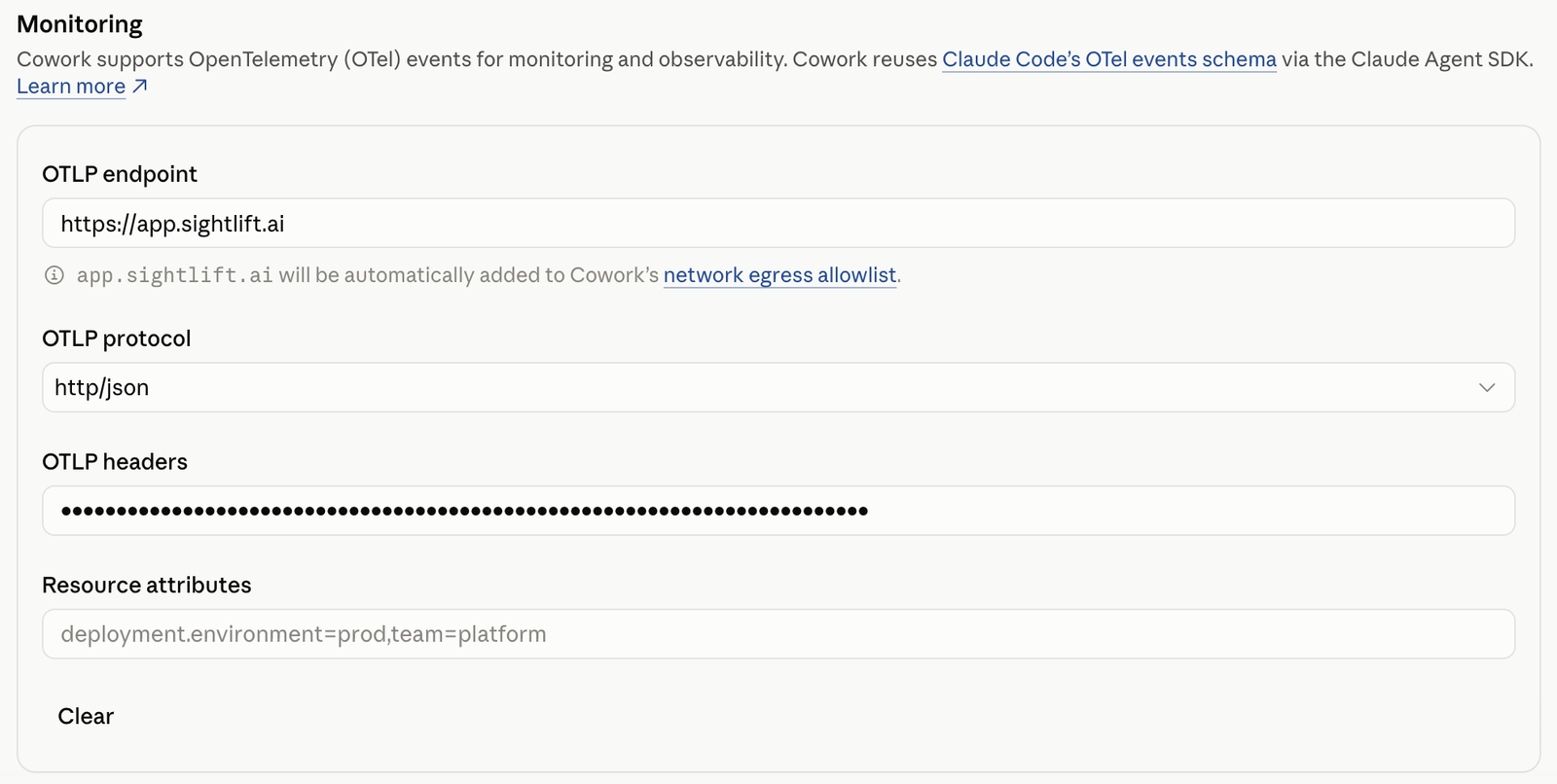 The Monitoring section of Cowork organization settings, showing OTLP endpoint, protocol, headers, and resource attribute fields.