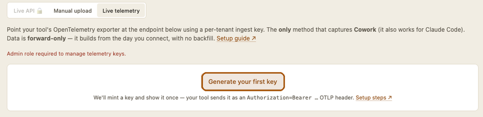 The Live telemetry tab before any key exists, showing the Generate your first key button.